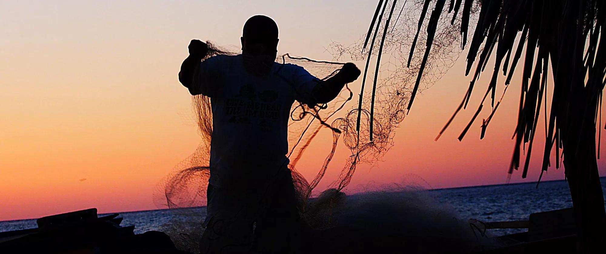 A fisherman at dusk in Timor-Leste