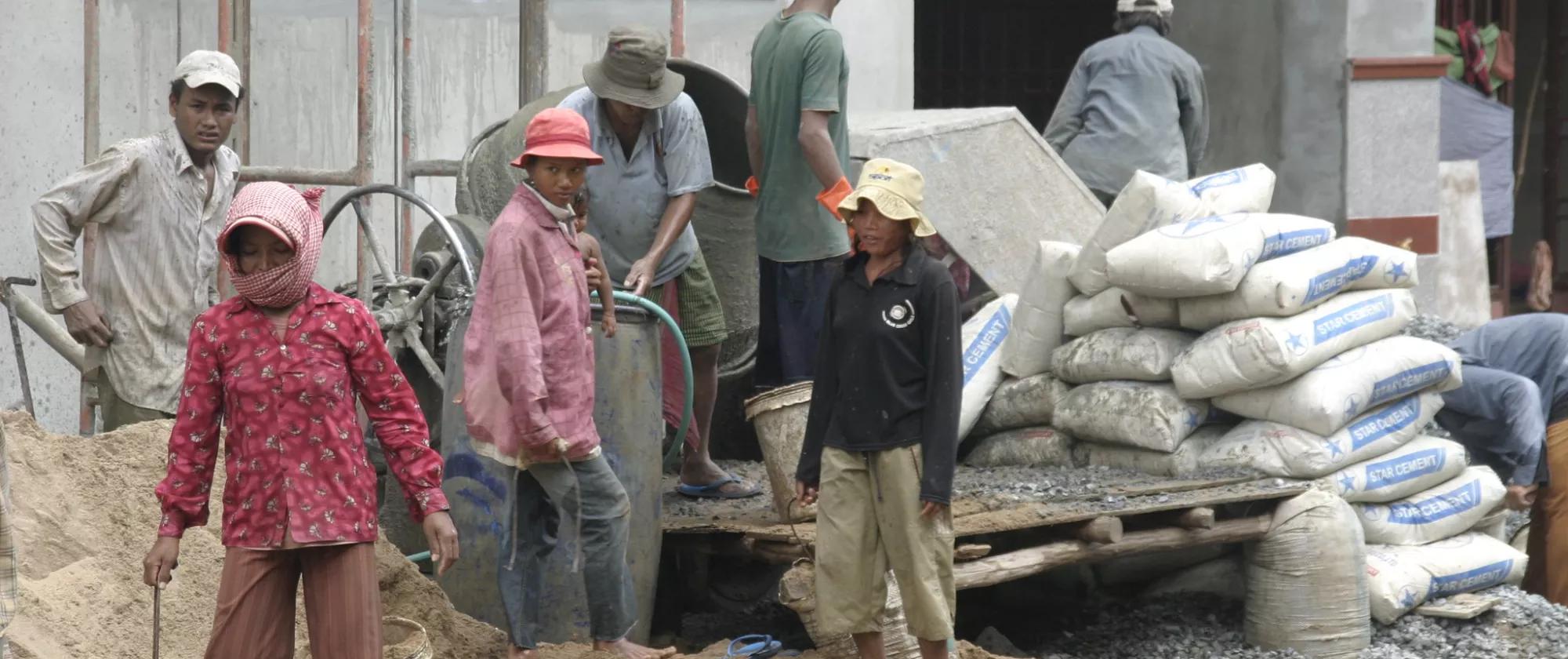 A group of construction workers on a building site in Cambodia