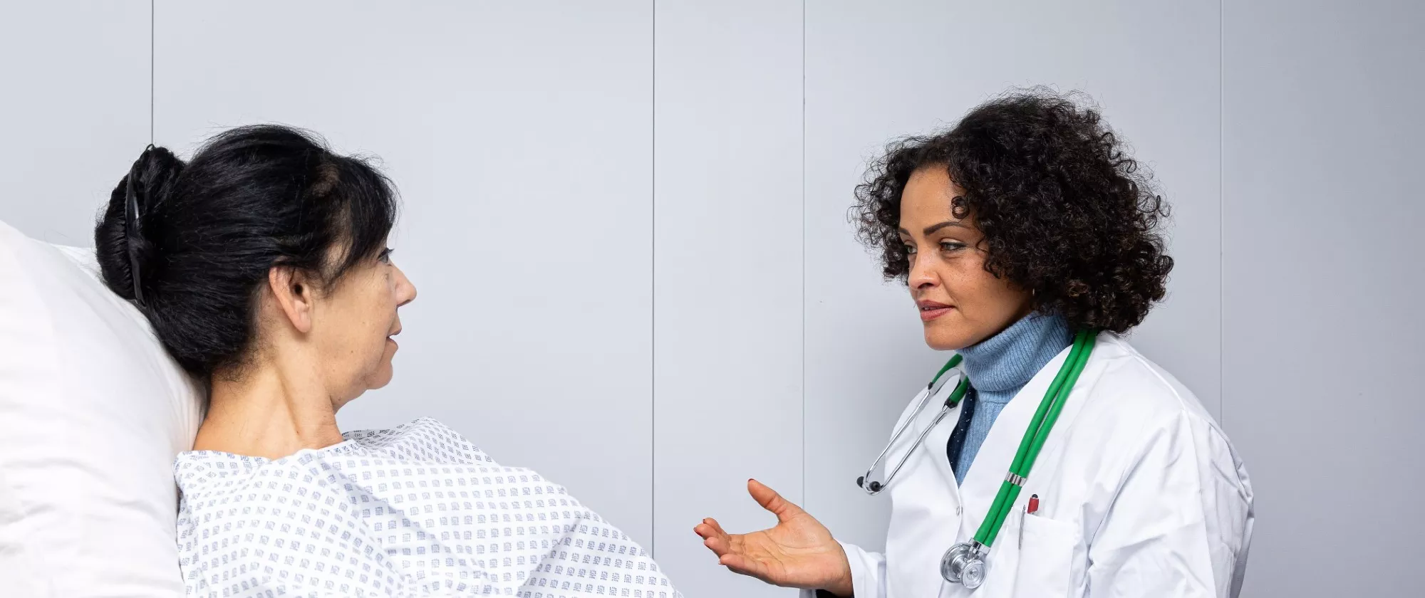 Doctor consults with a patient at a hospital