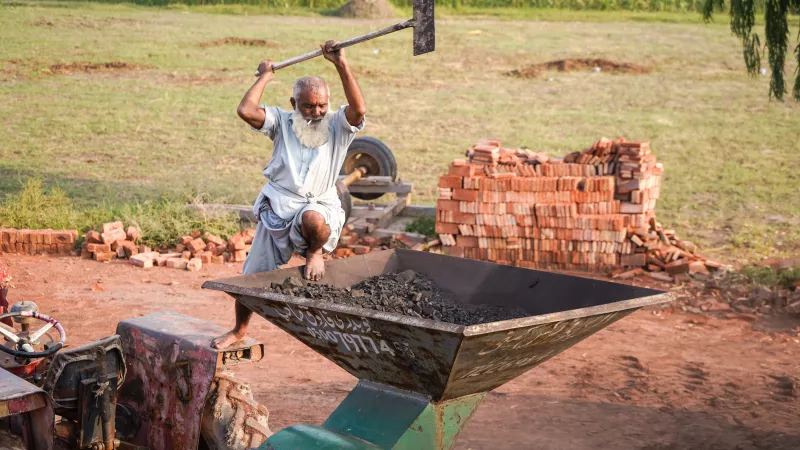 Worker at the brick kiln in Faisalabad, Pakistan