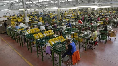 Workers on a factory floor