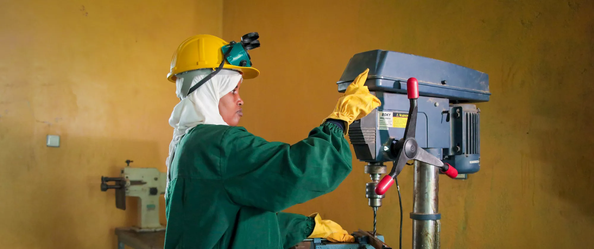 Female machine shop worker