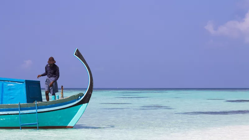 Fisherman gets ready to cast his net