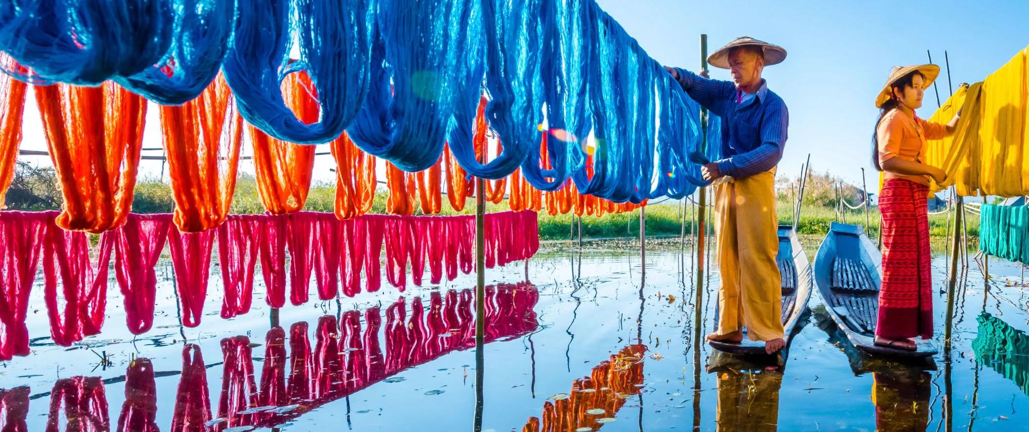 Making handcrafted lotus fabrics in Inle Lake of Myanmar