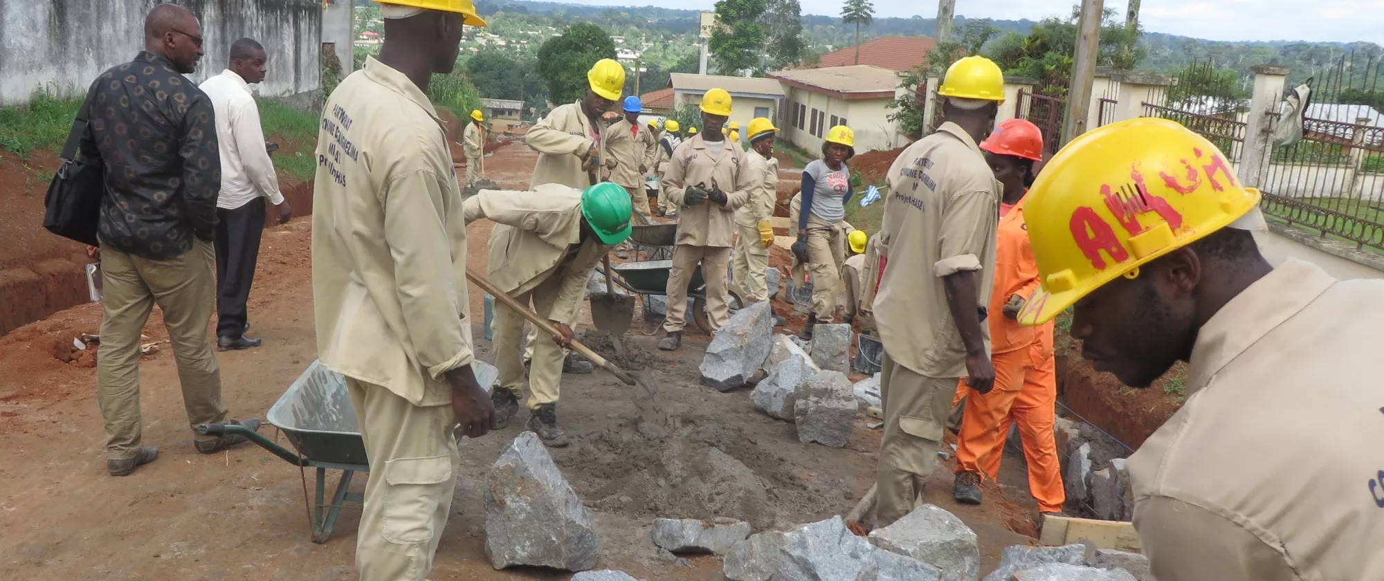 photo of workers repairing a road