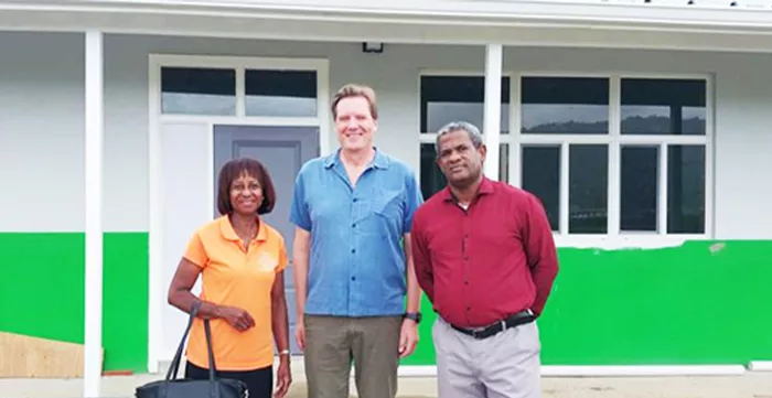 Photo of ILO Caribbean Deputy Director Lars Johansen with Tracy Dolcy and Karleen Mason