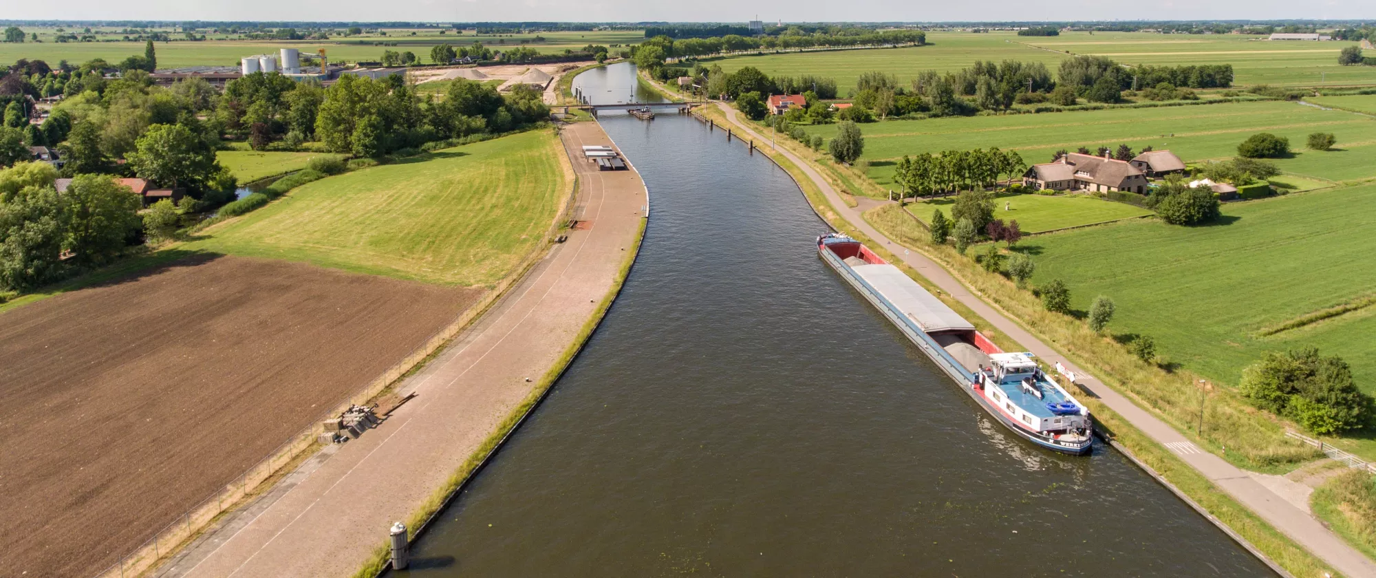 Aerial shot of the Merwede canal near the Arkel village located in the Netherlands.