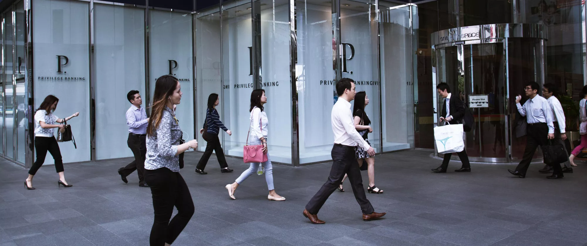 Office workers heading for work in Singapore