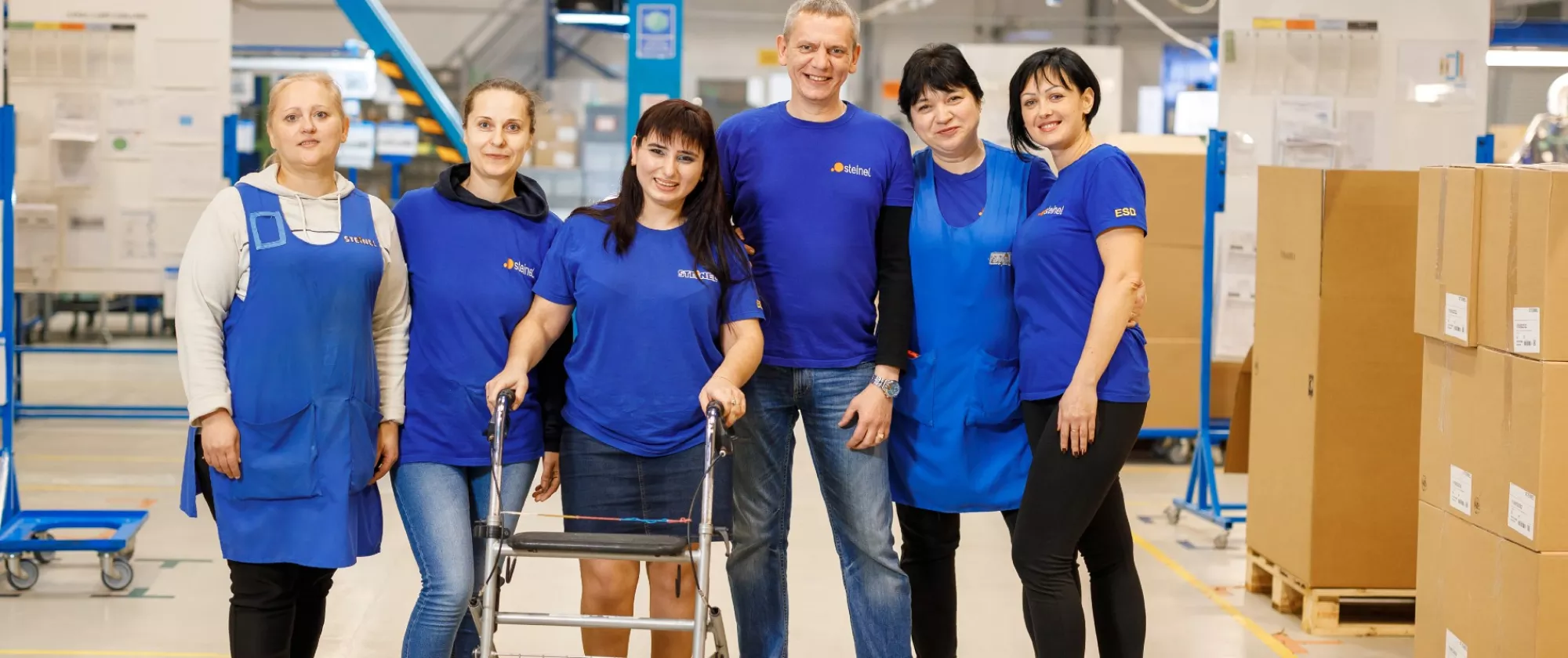 Decorative image of a group of workers, including single mother Elena Epuri who lives with a disability in Chisinau, Republic of Moldova.