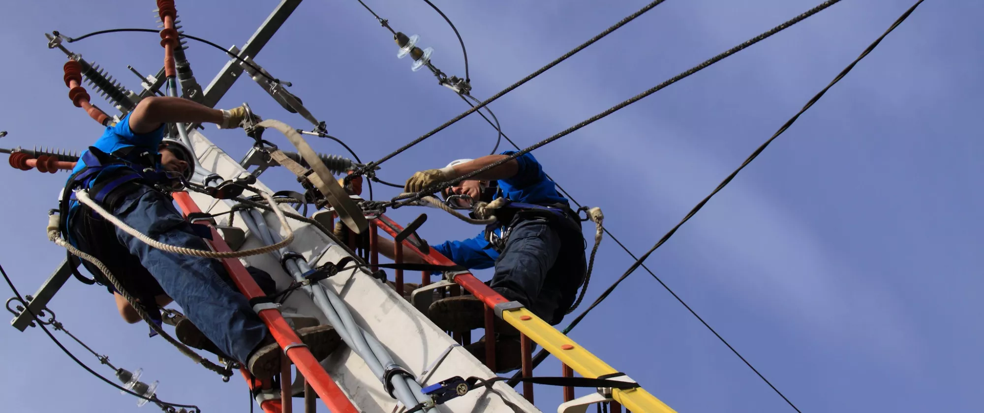 Workers on telecommunication tower