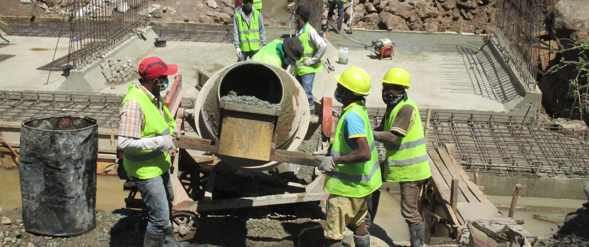 Workers build a rural road in Timor-Leste